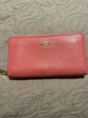 COACH Coral Pink Pebbled Leather Zip-Around Wallet with Gold Logo